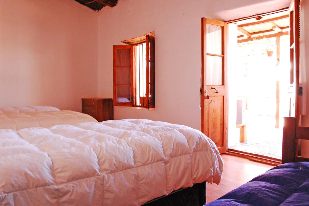 La Casa Del Pueblo Hostal San Pedro De Atacama Chambre photo